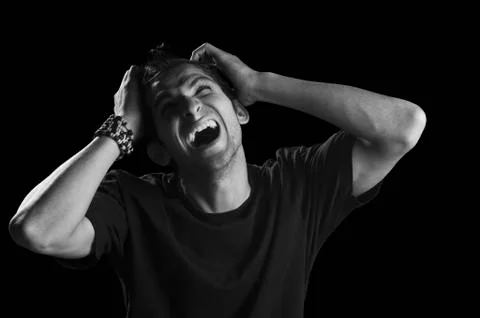 Close-up of a man screaming Stock-Fotos