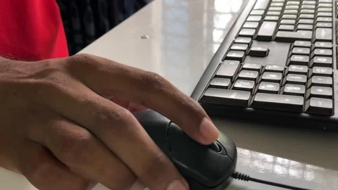 Close up of man scrolling and clicking computer mouse Stock Footage 315019241