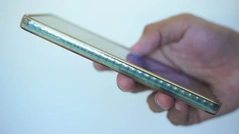 Close-up man scrolling mobile phone screen. internet browsing Stock Footage 322116126