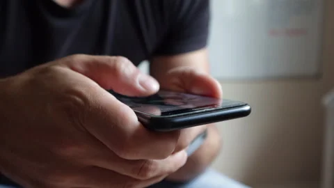 Close Up Of A Man Scrolling Through Social Media Stock Footage 248761780