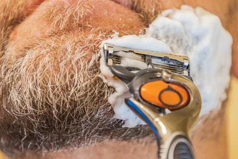Close Up Man Shaving Beard Stock Photos