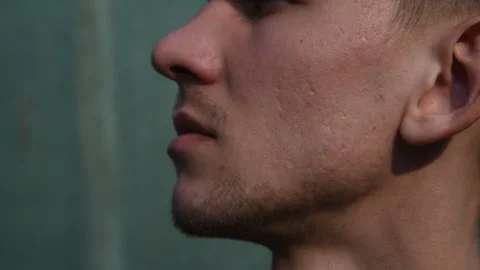 Close-up of a man shaving his beard on his face with a Black razor. Stock Footage 131143775