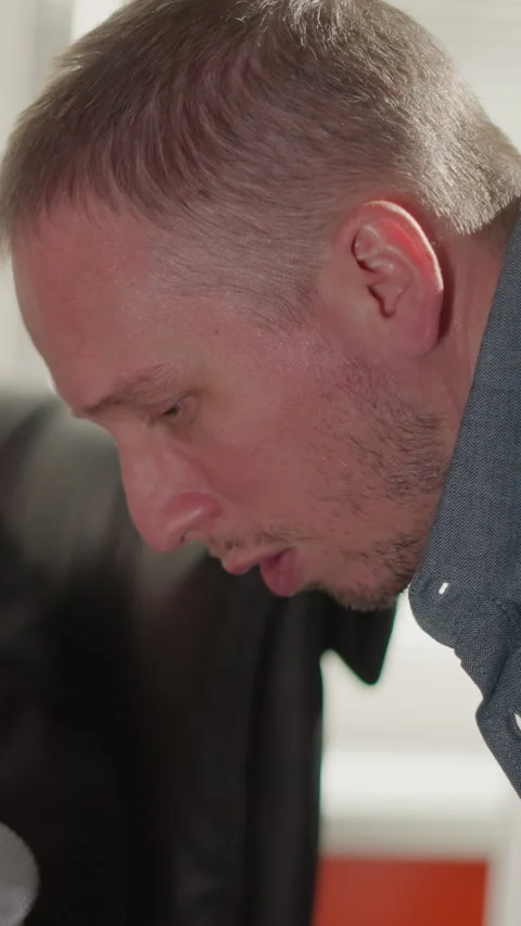 Close-up of Man Singing in Studio While Producer Works on Computer Stock Footage 309710285
