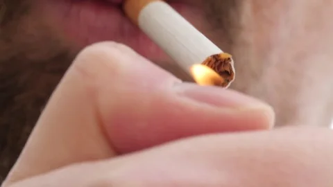 Close up of man smoking a cigarette. Stock Footage 76020186