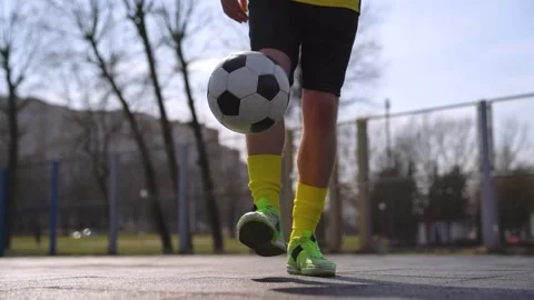 Close-Up Of A Man Soccer Player Training On A Soccer Field. Stock Footage 152080798