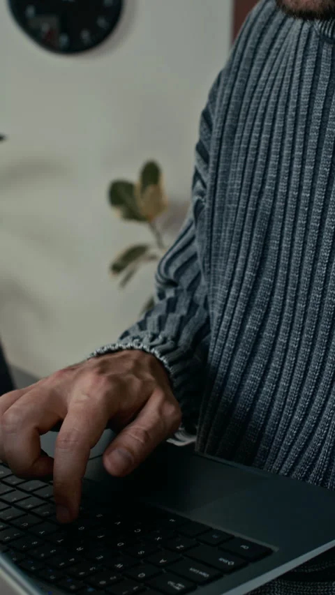 Close-up of Man Solving Project Problems on Laptop in Modern Office Stock Footage 302373097