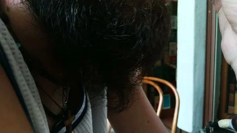 Close up of man speaks and thinks Stroking his Beard. Stock Footage 111502702