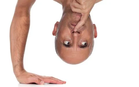 Close up of a man standing on one hand Stock Photos