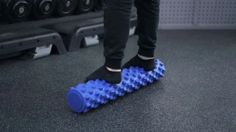 Close up of a man standing on a roll in gym 動画素材 76847770