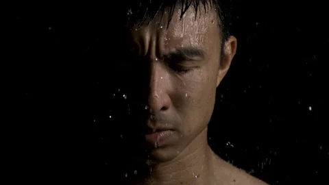 Close up of Man Standing Under Rain Stock Footage 270303668