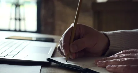 Close up of man studying online using laptop and video call with teacher and Vidéo 156870917