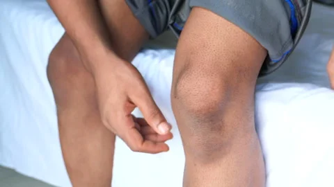 Close up on man suffering knee joint pain Stock Footage 137600628