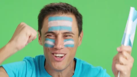 Close up of a man supporting argentine team Stock Footage 253844428