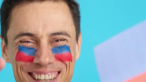 Close up of a man supporting haitian team Stock Footage 253122321