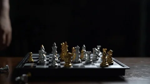 Close up Man sweep chess piece on chessboard loser concept Slow motion Stock Footage 106801790