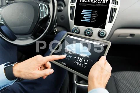 Close up of man with tablet pc in car Stock Photos
