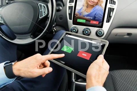 Close up of man with tablet pc in car Stock Photos