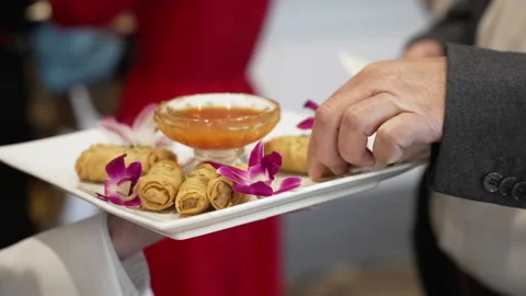 Close Up Of A Man Taking Appetizer Video stock 205510916