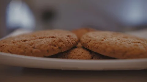 Close-Up Of A Man Taking A Cookie In The Morning. Stock Footage 121891072