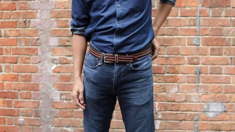 Close up of a man taking out his smartphone frome jean pocket, daytime, outdo Stock-Footage 150342123