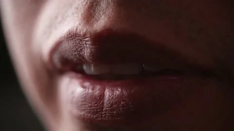 Close-up of a man talking in slow motion Stock Footage 142774654