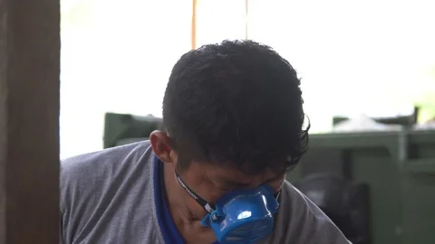 Close-up. the man in the trap sorts the trash. in a landfill. Stock Footage 127369200