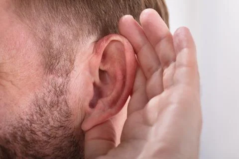 Close-up Of A Man Trying To Hear Stock Photos