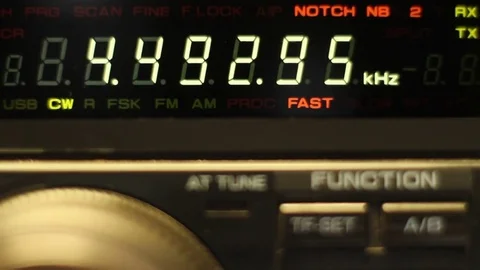Close up of a man tuning a shortwave ham radio Stock Footage 77694222