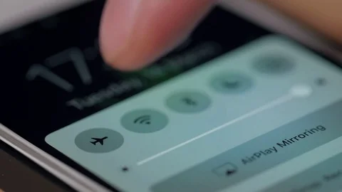 Close up man turn off smart phone on aircraft 스톡 동영상 73677756