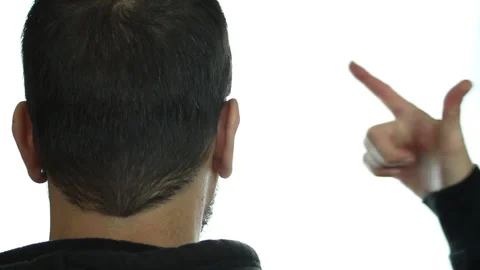 Close up, a man turned from behind imitates the gesture of suicide. Stock Footage 142153417