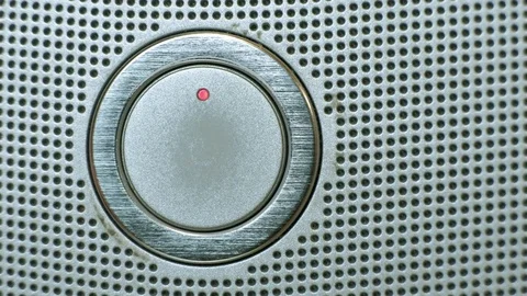 Close-up of a man turning on a television Video stock 85076999