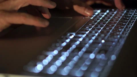 Close Up Of Man Typing On An Illuminated Keyboard Stock Footage 149993635