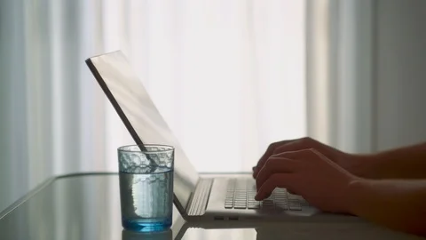 Close up man typing on laptop keyboard side view Video stock 122547187