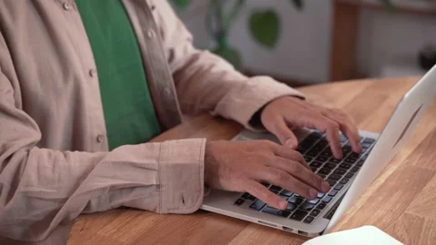 Close up of a man typing on laptop remote work in small business. Entrepreneur 스톡 동영상 223887288