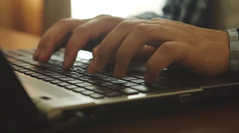 Close up of man is typing on a notebook Видео 53316775
