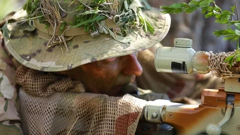 Camouflaged Sniper Rifle with Scope Stock Image - Image of