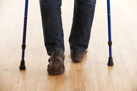 Close Up Of Man Using Crutches Stock Photos