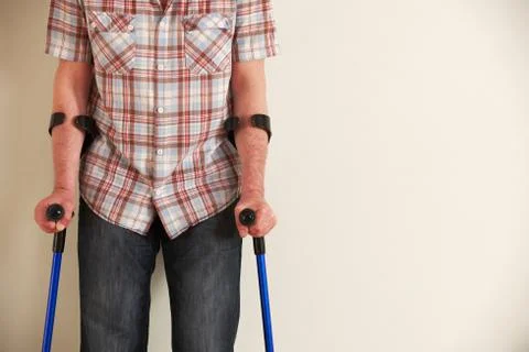 Close Up Of Man Using Crutches Stock Photos