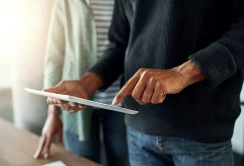 Close-up of a man using digital tablet Stock Photos