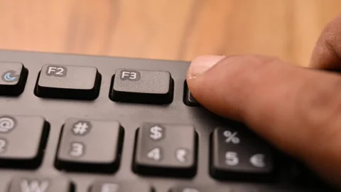Close Up of Man Using F4 Key on Keyboard for Window Control Action Stock Footage 333568976
