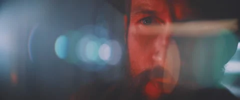 Close up of man using flashlight towards camera Stock Footage 203560812