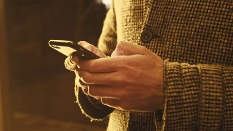 Close-up of man using his phone. 4k video footage Stock Footage 155754116