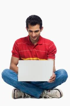 Close-up of a man using a laptop Fotos Stock