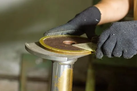 Close up of a man using a machine Stock Photos
