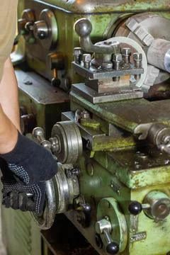 Close up of a man using a machine Фото