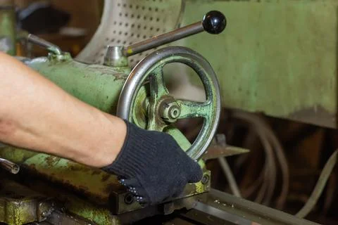 Close up of a man using a machine Stock Photos