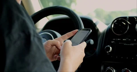 Close up of man using a mobile phone to check email for work or text SMS. Stockbeeldmateriaal 313950706