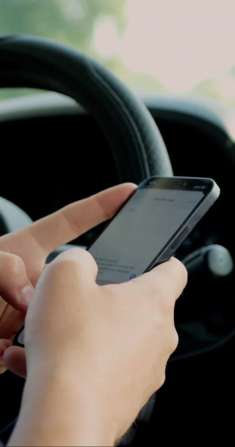 Close up of man using a mobile phone to check email for work or text SMS... Vidéo 344454925