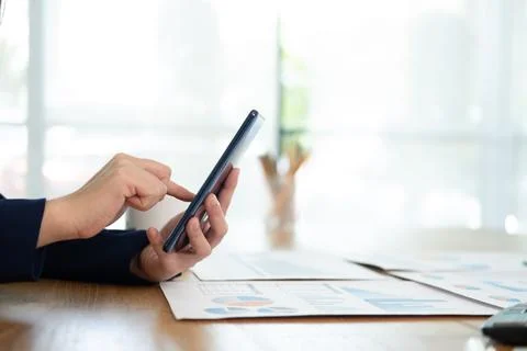 Close up of man using mobile phone. Stock Photos