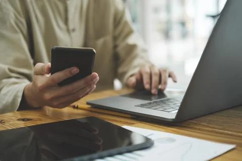 Close up of man using mobile phone. Stock Photos